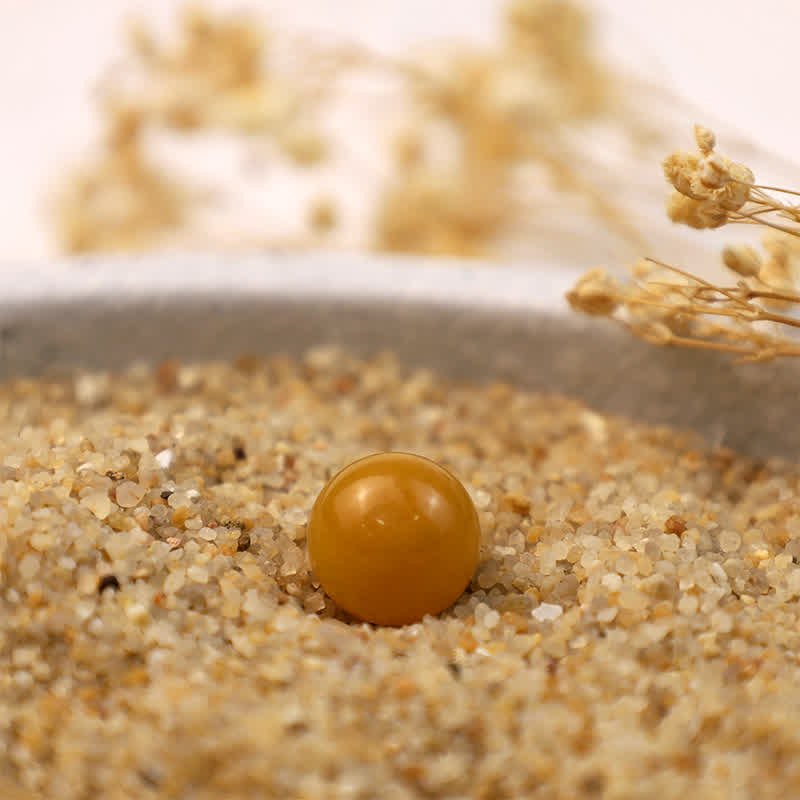 Olivenorma Yellow Jade Positive Crystal Sphere - Crystal Sphere - image 0