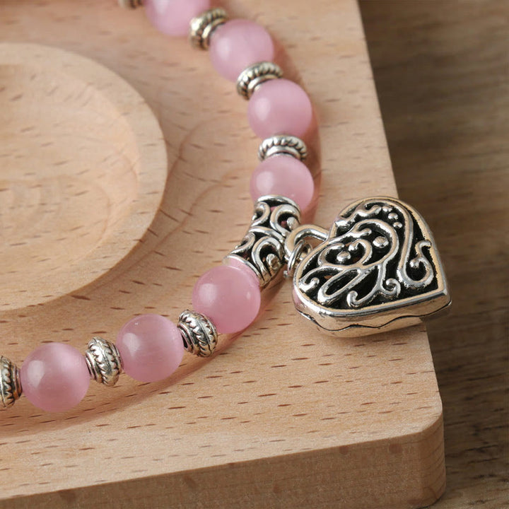 Olivenorma Hollow Love Pendant Pink Cat's Eye Bracelet - image 1