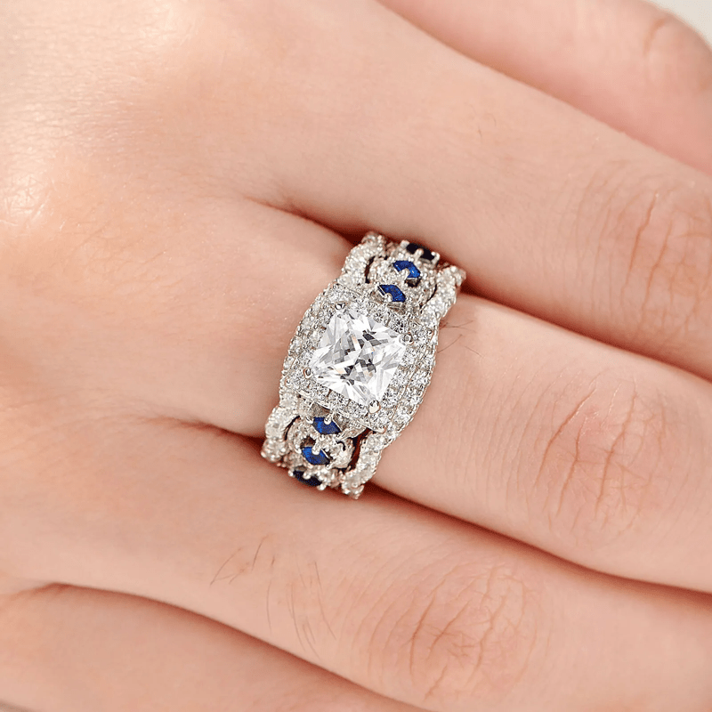 FREE Today:  Blue Sapphire Twisted Halo 3 Pcs Ring Set - image 1