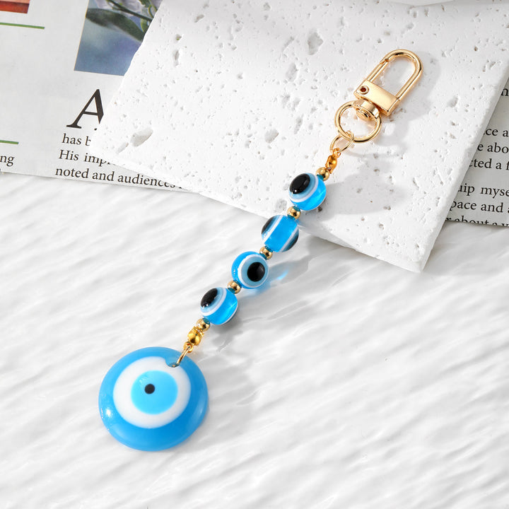Olivenorma Handmade Evil Eye Resin Ornament Keychain - SkyBlue - image 1