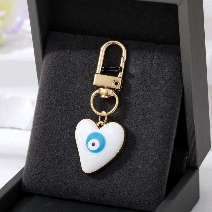 Olivenorma Heart-Shaped Evil Eye Decoration Keychain - White - image 5