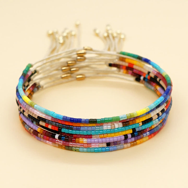 Olivenorma Colorful Rice Beads Beige Drawstring Bracelet - image 0