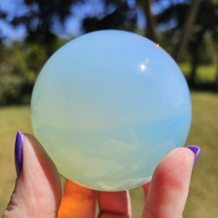Olivenorma Natural Opalite Crystal Sphere - 5-5.3cm Approx 220g - image 0