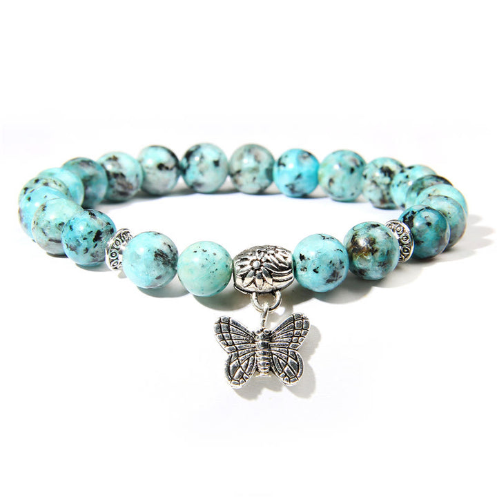 Olivenorma Natural Turquoise Butterfly Charm Gem Bracelet - African Turquoise - image 0