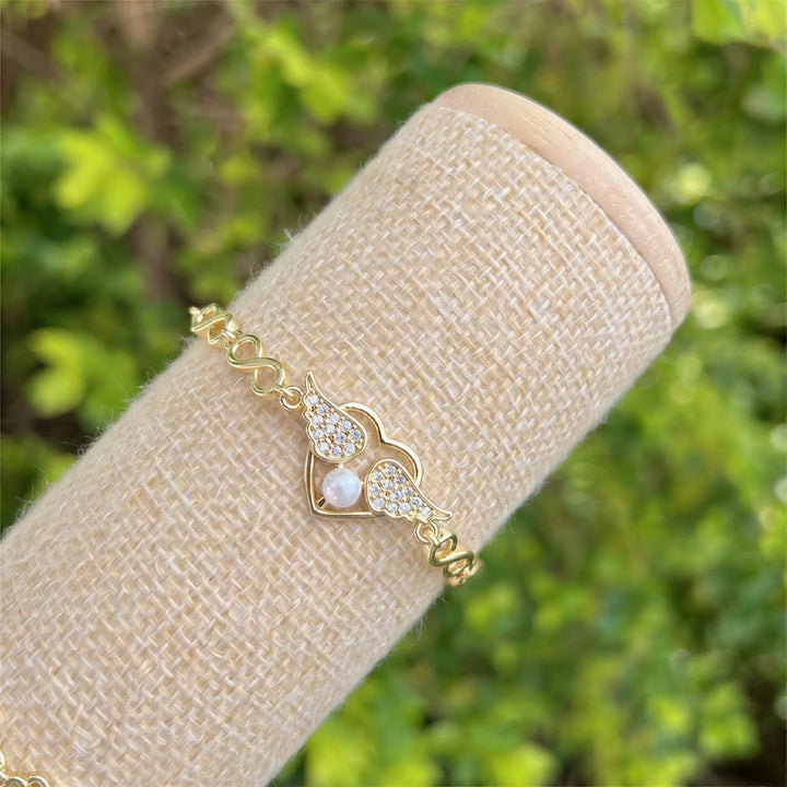 Olivenorma Copper Evil Eye Charm Design Protection Symbol Bracelet - Wing Heart Pearl Charm - image 6