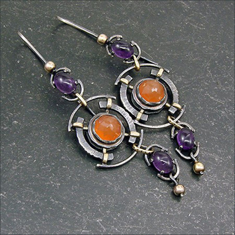 Olivenorma Retro Disc Hollow Inlaid Crystal Witch Earrings - image 1