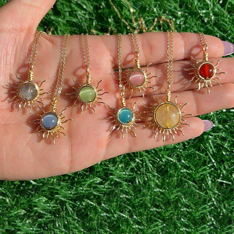 Olivenorma "Catch the sun's rays" - Wire Wrapped Sun Necklace - Purple Cat's Eye Stone - image 0