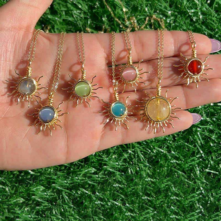 Olivenorma "Catch the sun's rays" - Wire Wrapped Sun Necklace - Purple Cat's Eye Stone - image 0